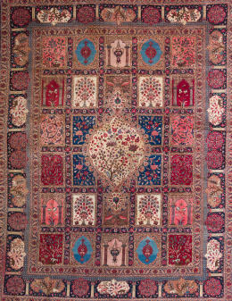 411.  Alfombra en lana con decoración de cartelas con árboles, lámparas de mezquitas y flores.Khorassan, S. XX.