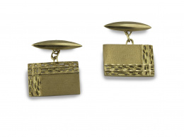 388.  Gemelos rectangulares con decoración grabada en dos lados