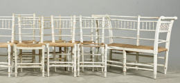 559.  Juego de siete sillas y  un canapé en madera lacada en blanco. imitando bambú. Francia segunda mitad  S.XIX.