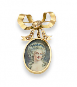 578.  Broche lazo de diamantes con miniatura de dama colgante en marco ovalado.