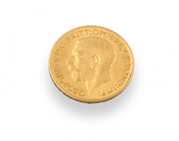 709.  Moneda de una libra de Jorge V en oro.1931.