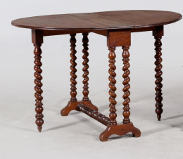 963.  “Sutherland” de madera de nogal.Trabajo inglés, S. XIX.