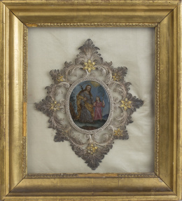 470.  “San José y Niño”Cristal pintado.Con marco de filigrana de plata en su color y plata sobre dorada.Trabajo español, S. XVIII.