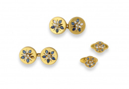 652.  Conjunto de gemelos dobles y dos botones de pp. s. XX con zafiros y diamantes dibujando flor en piezas circulares.