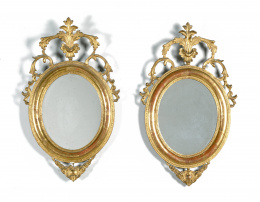 1095.  Pareja de espejos de madera tallada, estucada y dorada.Trabajo español, S. XIX.