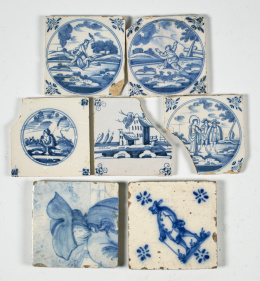 366.  Conjunto de siete azulejos de cerámica esmaltada en azul de cobalto, con diferentes escenas.Delft, Holanda, S. XVIII.