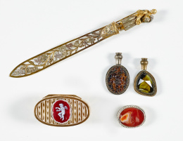 1228.  Abrecartas de plata y cobre con decoración calada de hojas, S. XIX.