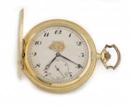 667.  Reloj saboneta de bolsillo MOVADO años 20-30 extraplano en oro de 18K.