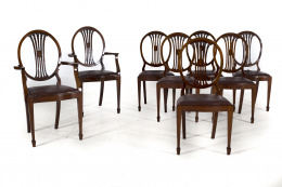 862.  Conjunto de seis sillas y dos butacas Jorge III en madera de caoba al estilo de Hepplewhite.Inglaterra, principios S. XIX.
