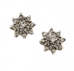 722.  Pendientes estrella de brillantes que suman 1,5 ct aprox en oro amarillo con frente de oro blanco de 18K.