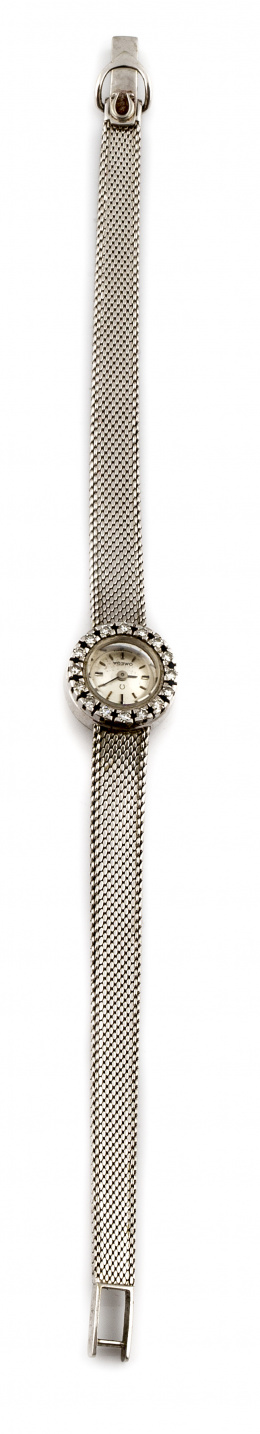 861.  Reloj OMEGA de pulsera sra años 60 en oro blanco de 18K y brillantes.