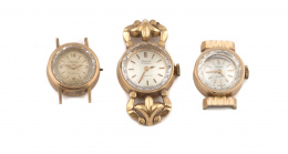 856.  Tres cajas de reloj de sra años 50 en oro rosa de 18K.