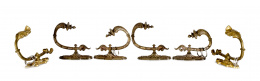 1060.  Juego de seis alzapaños de bronce dorado.Francia, h. 1900.