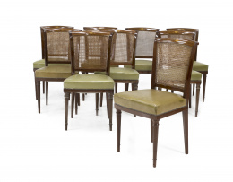 1036.  Conjunto de 12 sillas estilo Luis XVI en madera de caoba y respaldo de rejilla.Francia, S. XX.