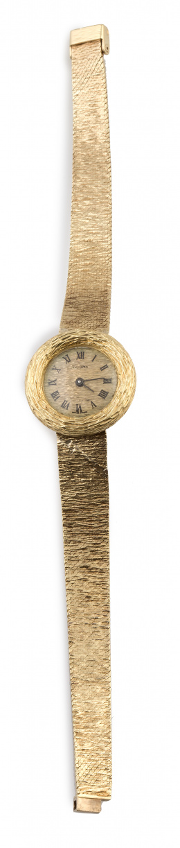 367.  Reloj DOGMA años 60 en oro amarillo matizado de 18K