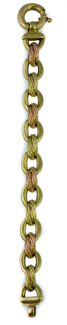 682.  Pulsera de eslabones en forma de soga alternos con eslabones lisos en oro bicolor de 18K