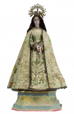 993.  “Virgen”Escultura vestidera en madera tallada y policromada, con pelo natural.Escuela española S. XIX.