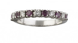 279.  Sortija media alianza de rubíes y brillantes en oro blanco de 18K