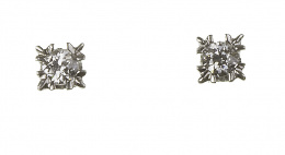 136.  Pendientes dormilonas de brillante en garras en forma de estrella