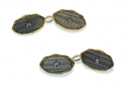 102.  Gemelos dobles Art-Decó con óvalos de platino grabado con brillante central