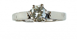 145.  Sortija solitario con un solitario de brillante de 0,55 ct en montura de seis garras de platino
