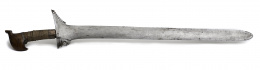 999.  Moro Kris, mango de madera con forma de pájaro y cuerda aplicada.Mindanao, Filipinas, S. XIX.