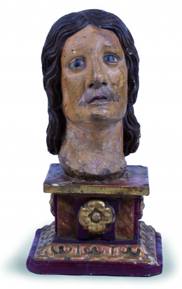 978.  Cabeza de SantaEscultura en madera tallada y policromadaS. XVI.