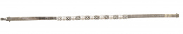 673.  Pulsera articulada con centro de perlas y brillantes en oro blanco de 18K