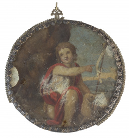 501.  Medalla devocional con San Juan niño, montado en plata en el revero con decoración de picado y rematado por cordoncillo.Trabajo español, XVIII - XIX.
