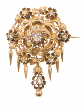 15.  Broche S. XIX con diamantes de talla rosa, en diseño de flor circular con perilla colgante