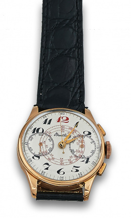 674.  Reloj BREITLING cronógrafo en oro de 18K años 50.