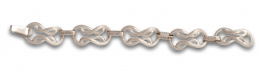 106.  Brazalete HERMES con nudos de rizo articulados. En plata.