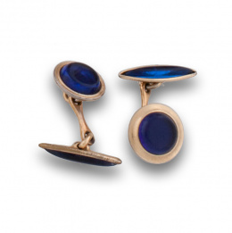 700.  Gemelos KREMENTZ con piezas circulares de resina azul en metal dorado.