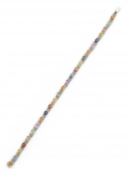 343.  Pulsera rivière de zafiros multicolor de talla oval entre parejas de brillantes, en oro blanco de 18K