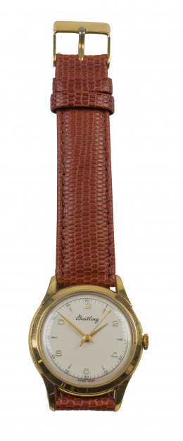 813.  Reloj BREITLING años 50 en metal dorado