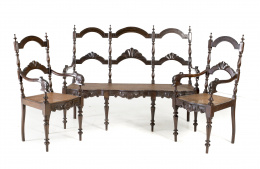 819.  Tresillo y dos sillones en madera de palosanto torneada y tallada con asiento de rejilla.Portugal, S. XIX.