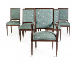 884.  Conjunto de seis sillas y una butaca estilo Luis XVI en madera de caoba.S. XX.