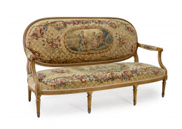 1072.  Canapé estilo Luis XVI en madera de haya, tallada, con tapicería de Boubuais S. XVIIIFrancia, S. XIX.