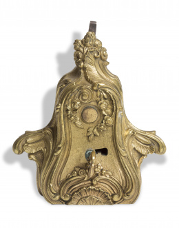 1086.  Cerradura de bronce de estilo rococó, con llave.Francia, S. XIX.