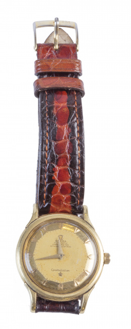 379.  Reloj OMEGA CONSTELLATION automático años 50 en oro de 18K