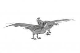 719.  Pareja de aves decorativas en plata, S. XX