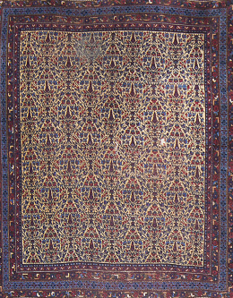 1279.  Alfombra en lana de profusa decoración vegetal, Persia.