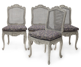 1103.  Juego de ocho sillas de estilo Luis XV de madera tallada y policromada.S. XX.