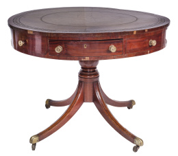 1167.  Mesa circular de librería de madera.S. XIX.