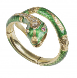 310.  Brazalete con diseño de serpiente S. XIX de esmalte verde y diamantes talla rosa recorriendo la parte superior