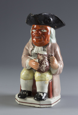 1188.  "Toby Jug".De porcelana esmaltada.Stafforshire, Inglaterra, S. XIX.