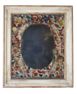 704.  Espejo de madera tallada con cristal eglomizado decorado con angelotes.Francia, h. 1840.