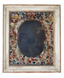 704.  Espejo de madera tallada con cristal eglomizado decorado con angelotes.Francia, h. 1840.