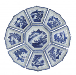 966.  Conjunto de nueve fuentes de servicio en porcelana esmaltada en azul y blanco.China, S. XIX