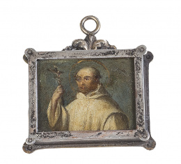 527.  Medalla devocional con marco de plata e imagen de San Bruno sobre cobre.Trabajo español, S. XVII.